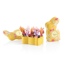 Open Venchi yellow bunny tin with chocolates inside